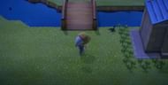 Player trying to catch a scorpion in Animal Crossing: New Horizons (Image via Gamer Journalist)